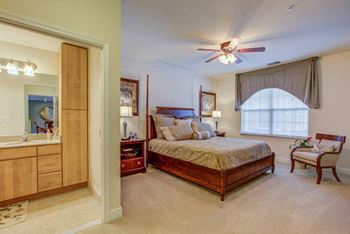 Spacious bedroom with comfortable bed